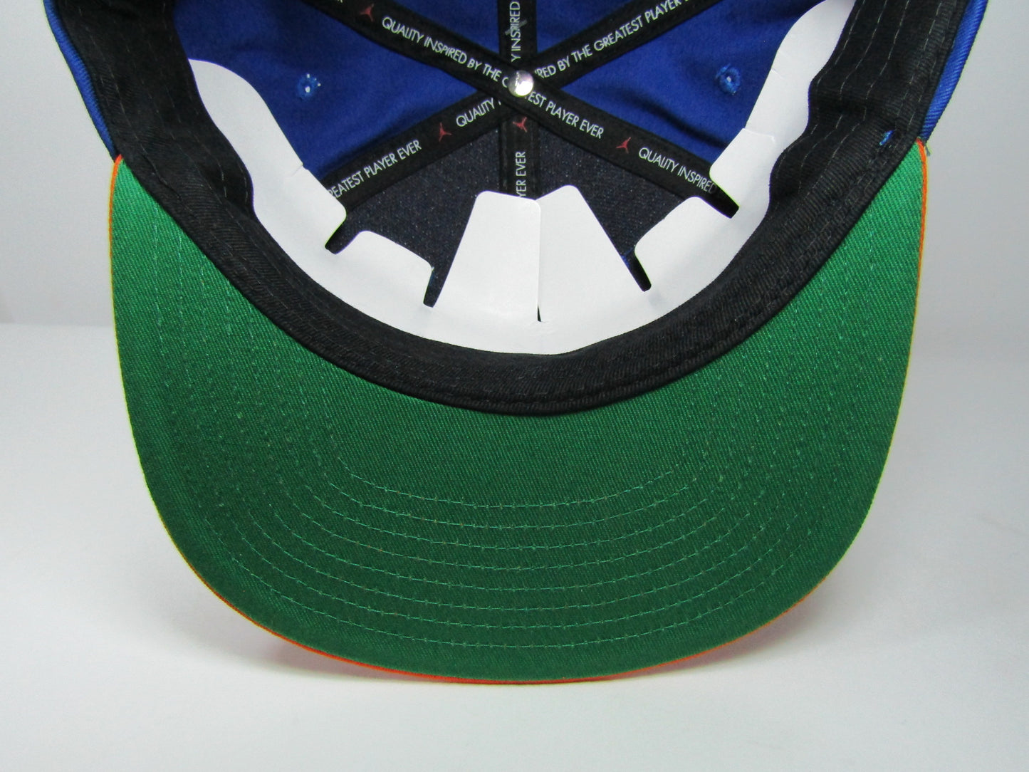 GORRA JORDAN PLANA PRO SCRIPT BLUE ORANGE UNITALLA ADULTO