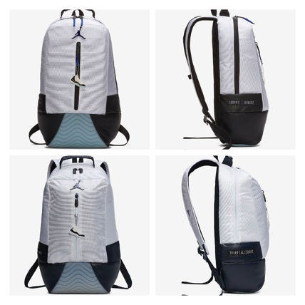 MOCHILA JORDAN XI OBSIDIAN CON LLAVERO