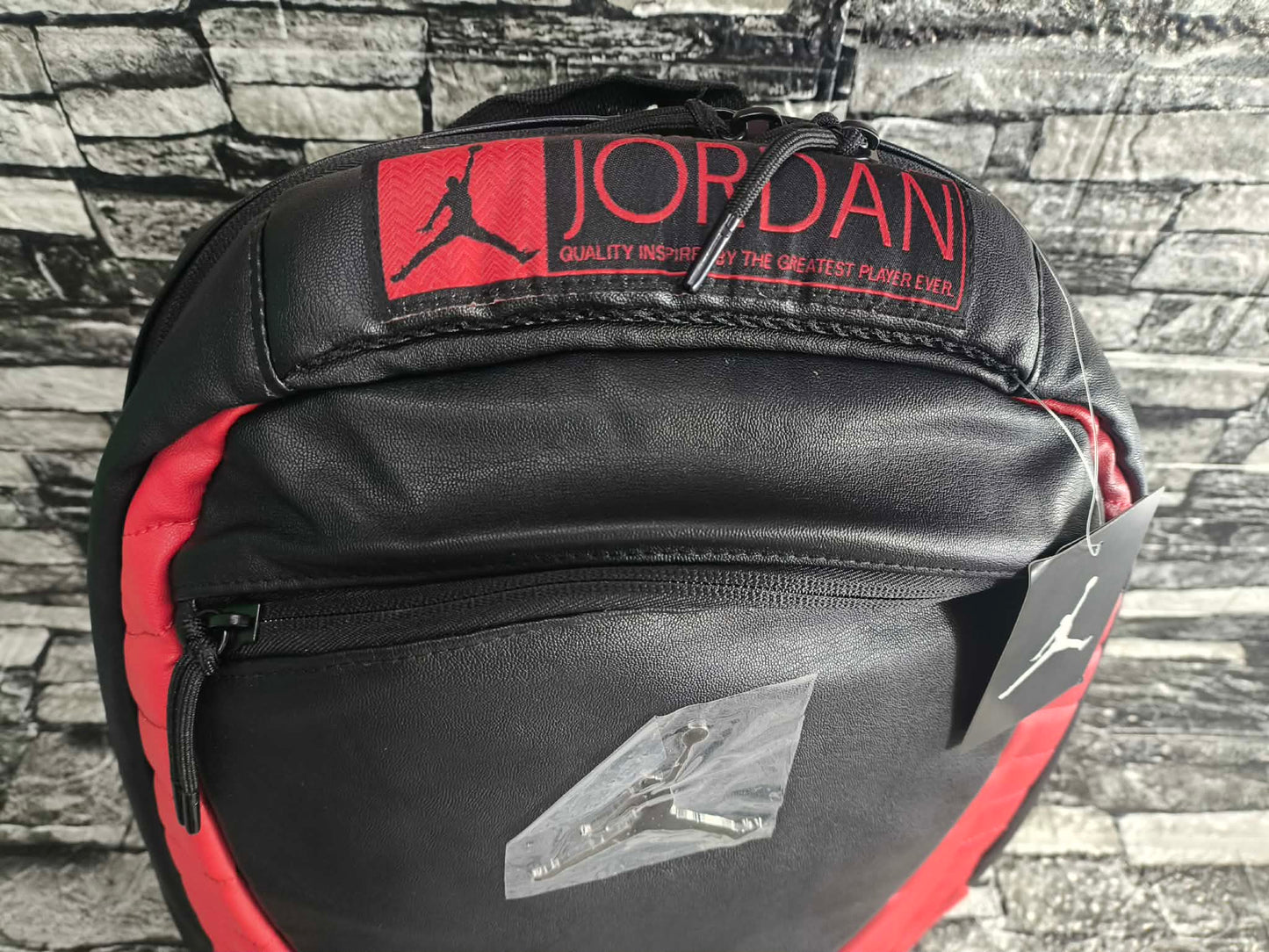 MOCHILA JORDAN 12 BRED FLUE GAME EDITION ESP LAPTOP 15"