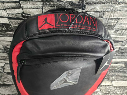 MOCHILA JORDAN 12 BRED FLUE GAME EDITION ESP LAPTOP 15"