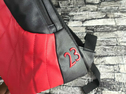 MOCHILA JORDAN 12 BRED FLUE GAME EDITION ESP LAPTOP 15"