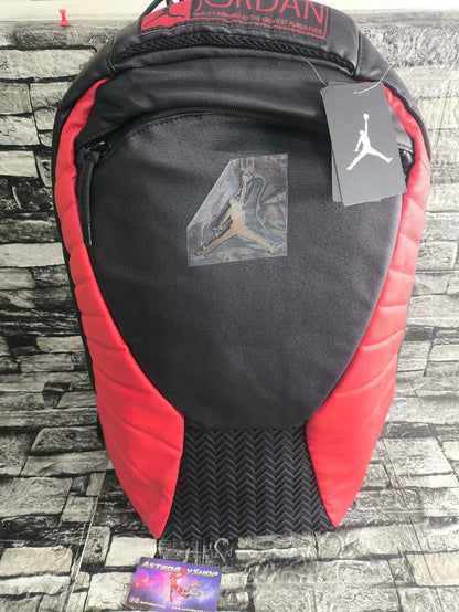 MOCHILA JORDAN 12 BRED FLUE GAME EDITION ESP LAPTOP 15"