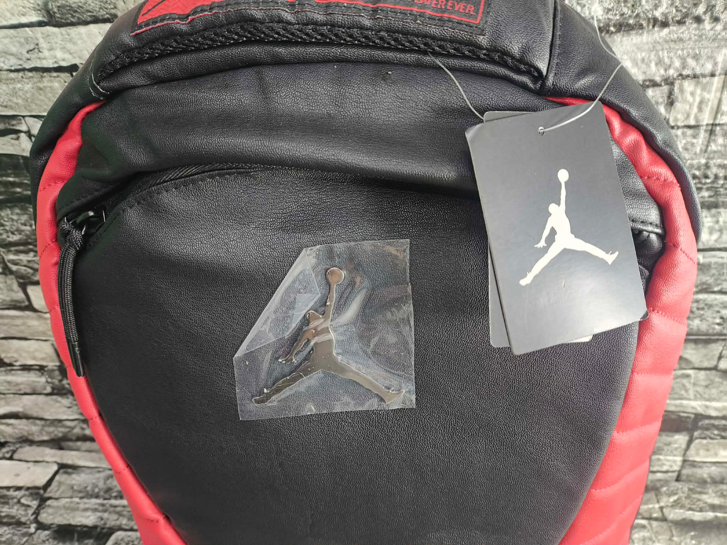 MOCHILA JORDAN 12 BRED FLUE GAME EDITION ESP LAPTOP 15"