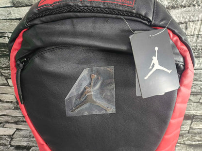 MOCHILA JORDAN 12 BRED FLUE GAME EDITION ESP LAPTOP 15"
