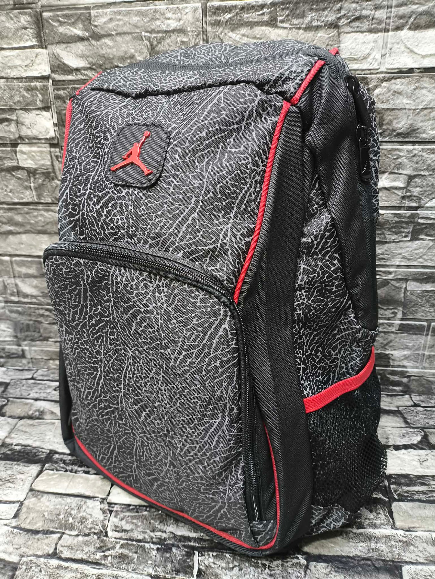 MOCHILA JORDAN JUMPMAN23 ELEPHANT PRINT LOGO DE METAL
