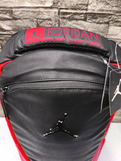 MOCHILA JORDAN 12 BRED FLUE GAME EDITION ESP LAPTOP 15" oferta