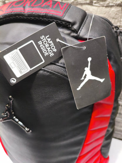MOCHILA JORDAN 12 BRED FLUE GAME EDITION ESP LAPTOP 15" oferta