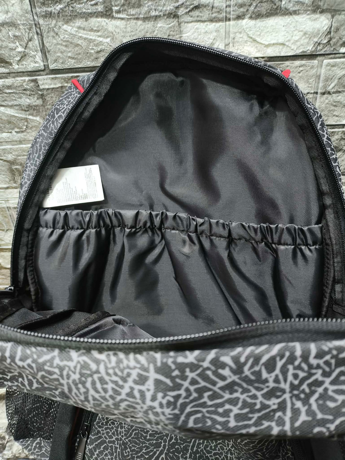MOCHILA JORDAN JUMPMAN23 ELEPHANT PRINT LOGO DE METAL