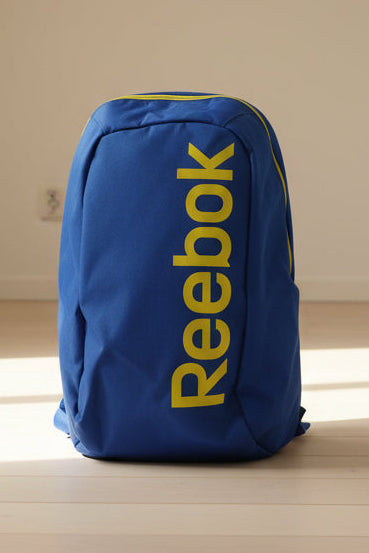 MOCHILA RBK BAGPACK BASICS BLUE GREEN (40 ALTO X 26CM ANCHO)