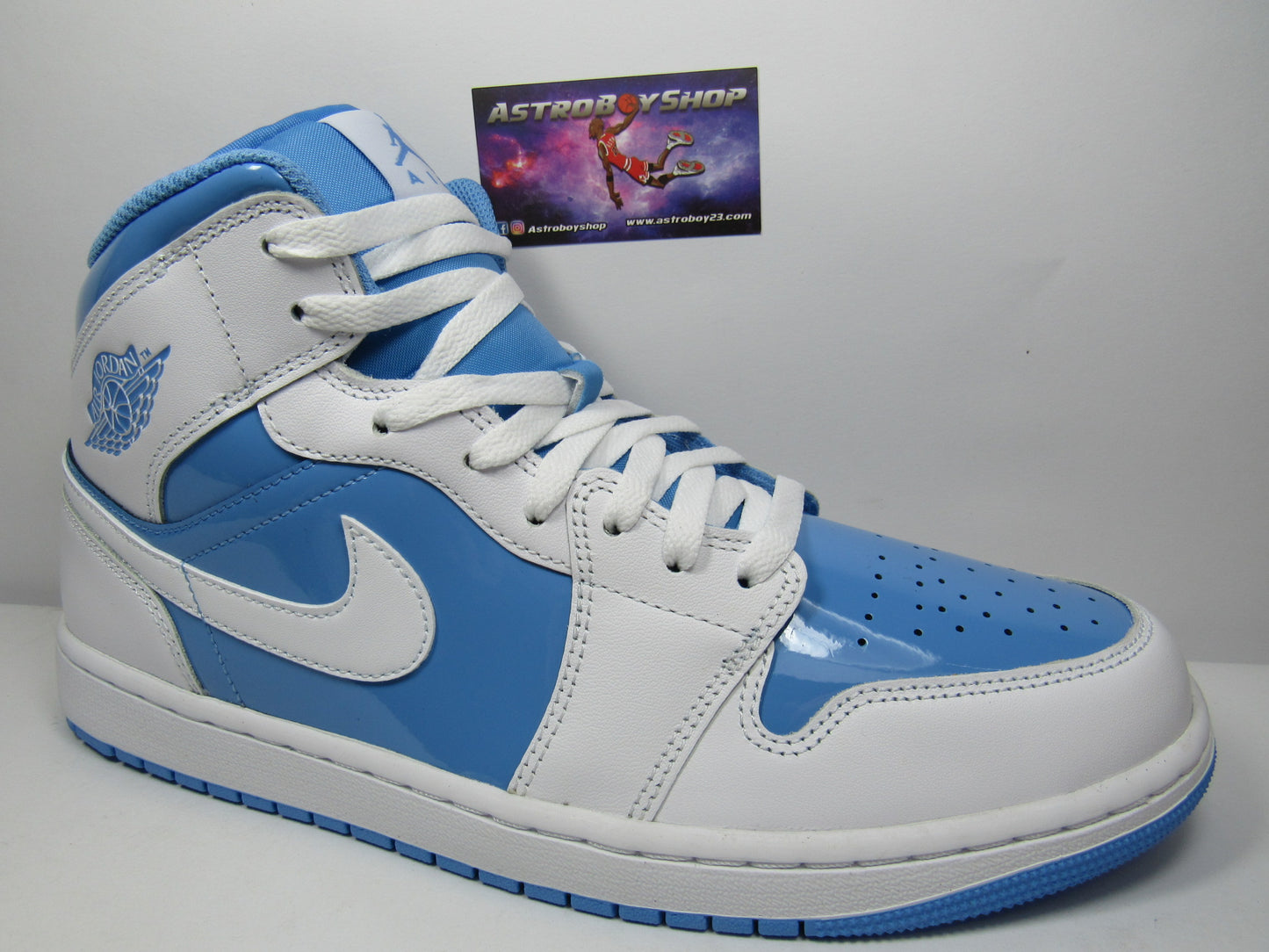 JORDAN 1 MID SE PATENT LEGEND BLUE EN CAJA