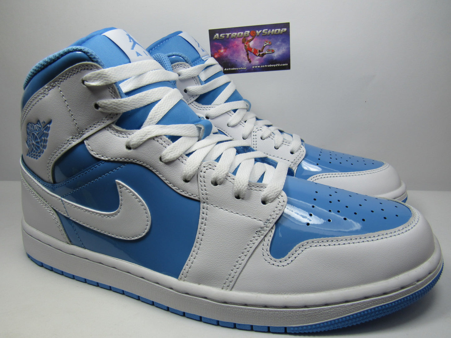 JORDAN 1 MID SE PATENT LEGEND BLUE EN CAJA