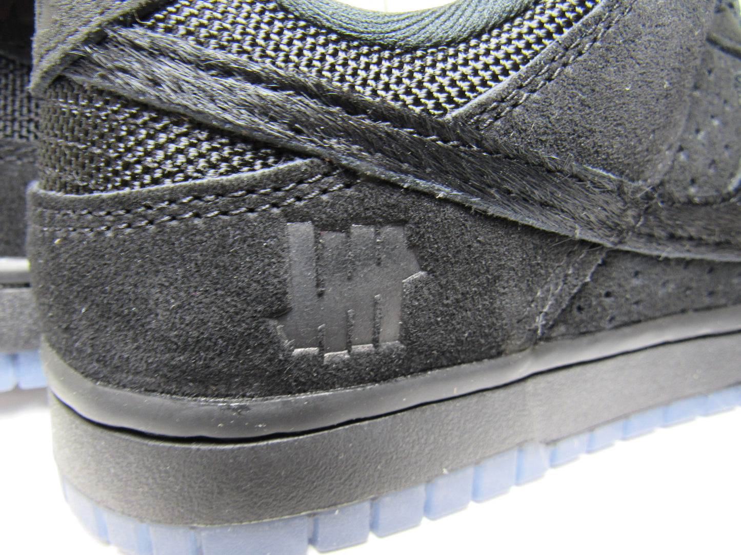 NIKE DUNK LOW X UNDEFEATED 5ONITBLACK EN CAJA